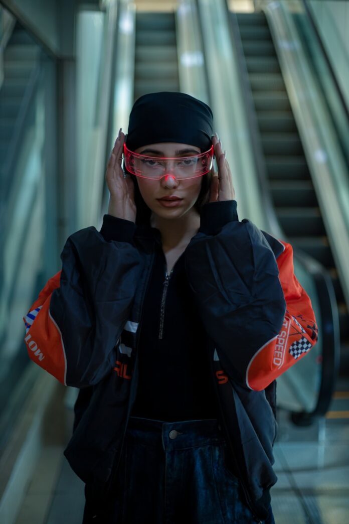 Photo by Amir Abbaspoor A person with headphones and a jacket on